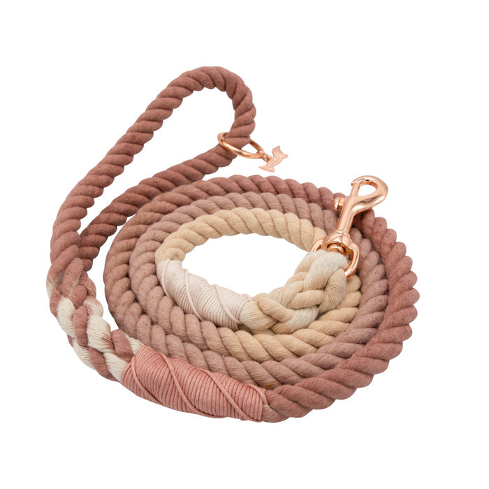 The Sassy Woof Dog Rope Leash - Pearly is a hand-crafted leash with a metal clasp, featuring an ombre gradient from light beige to muted pink and rose, shown on a white background.
