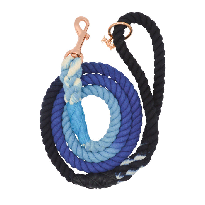 The Sassy Woof Dog Rope Leash - Romeo features a hand-crafted ombre design blending black, dark blue, light blue, and white, and is accented with elegant rose gold hardware including a metal clasp and ring.
