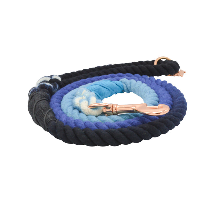 The Sassy Woof Dog Rope Leash - Romeo is a hand-crafted leash with an ombre rope transitioning from black to dark blue to light blue, finished with elegant rose gold hardware, including a metal clasp and ring.
