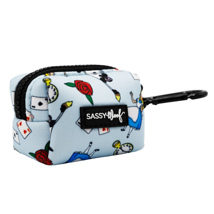 The Sassy Woof Dog Waste Bag Holder - Alice in Wonderland (Blue) is a light blue, rectangular holder with a black zipper and clip, featuring playful card, red rose, and pocket watch designs—a must-have for any Alice in Wonderland fan.