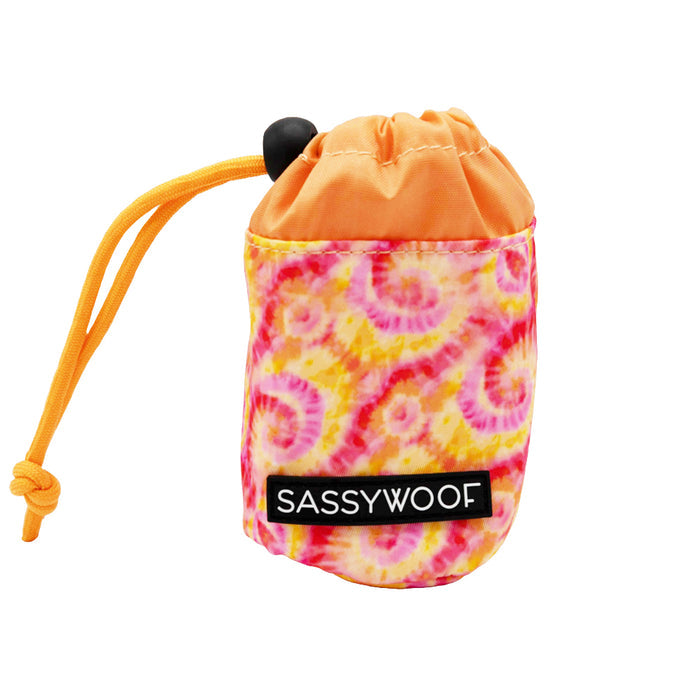The Sassy Woof Treat Pouch - Summer Sorbet features a vibrant tie dye design, ideal for carrying dog treats. Pair it with the matching harness for a playful summer look.